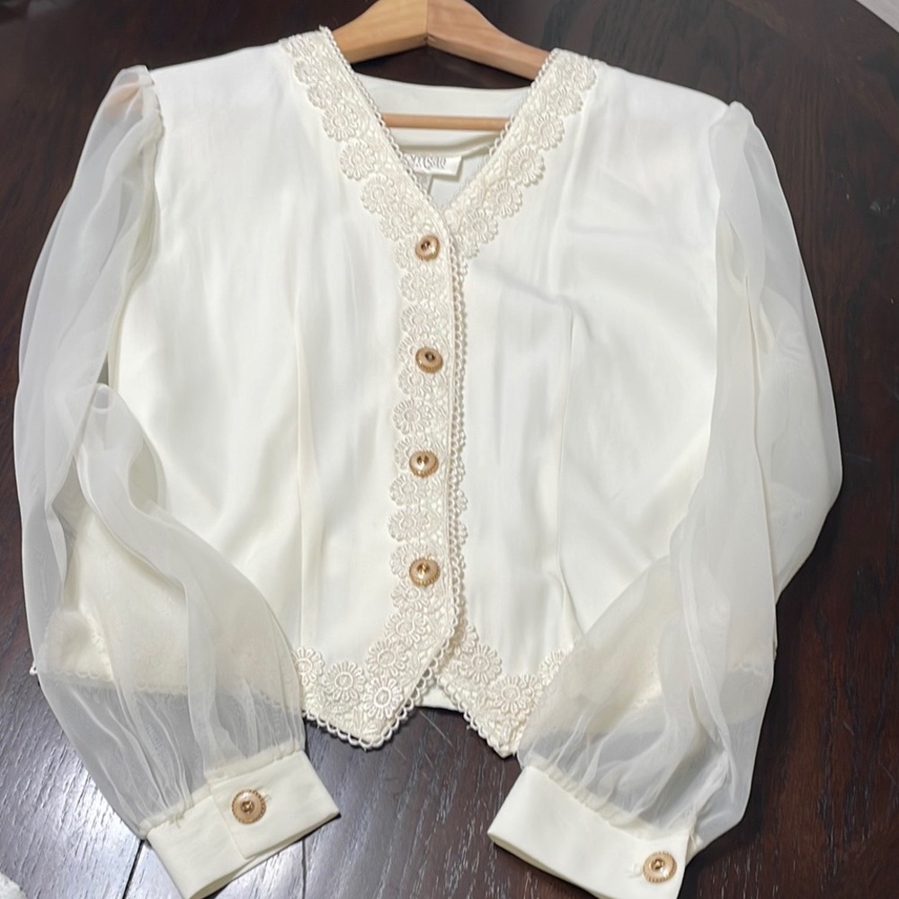 Chic Cream Blouse with Lace and Sheer Sleeves